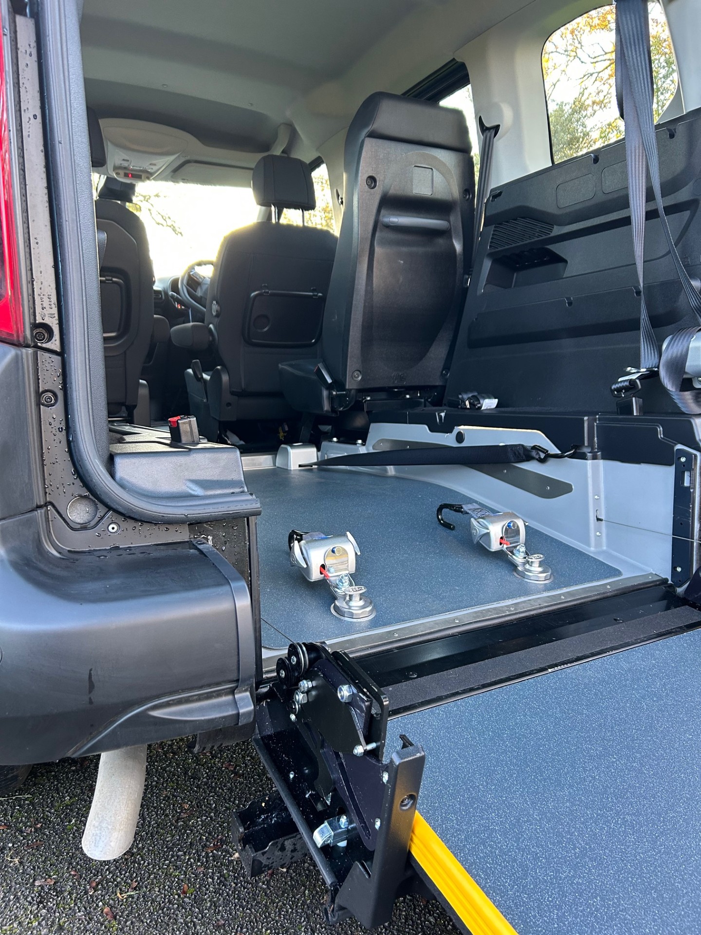 Citroen Berlingo SWB view from back of car with ramp deployed looking at single rear seat