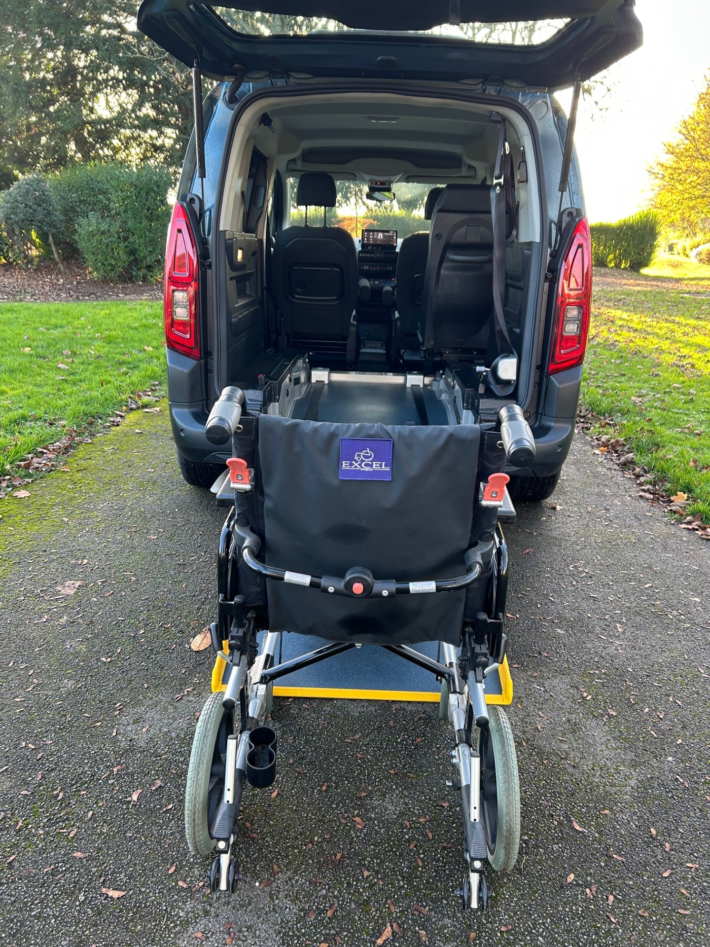 Citroen Berlingo SWB with ramp deployed and wheelchair ready to enter